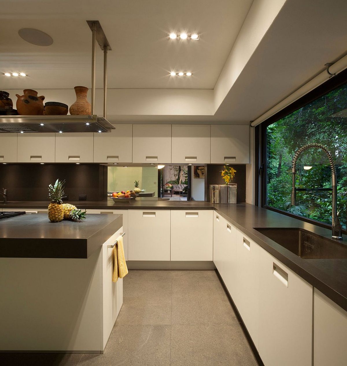 1489545038393010.jpg Spacious-contemporary-kitchen-makes-smart-use-of-corner-space.jpg